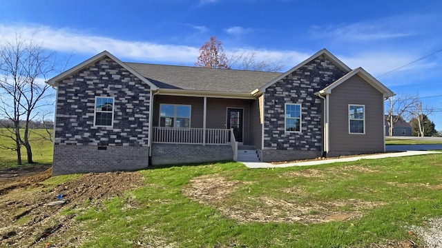 ranch-style house with a front yard and a porch