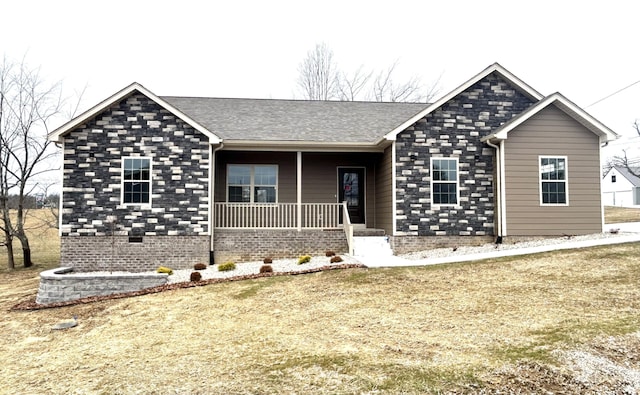 single story home featuring a front lawn and a porch