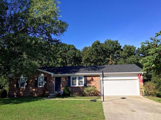 ranch-style home with a garage and a front yard