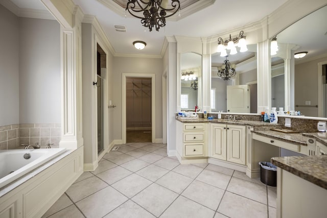 bathroom with ornamental molding, a garden tub, tile patterned flooring, vanity, and a shower stall