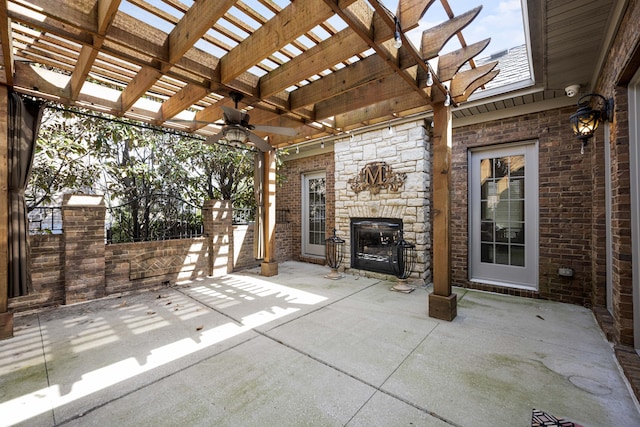 view of patio / terrace with fence and a pergola