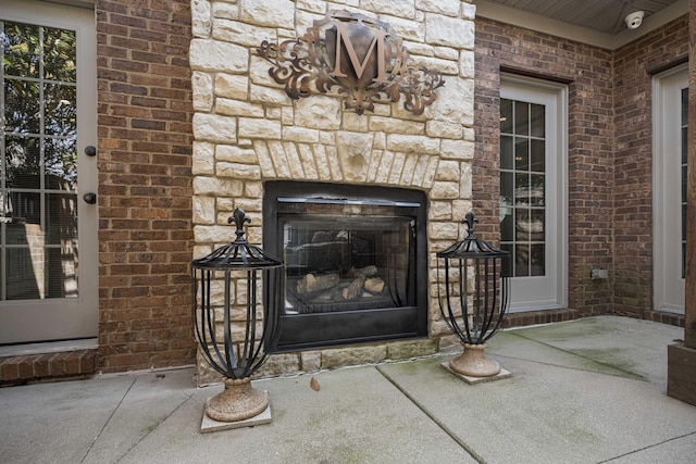 room details with an outdoor stone fireplace