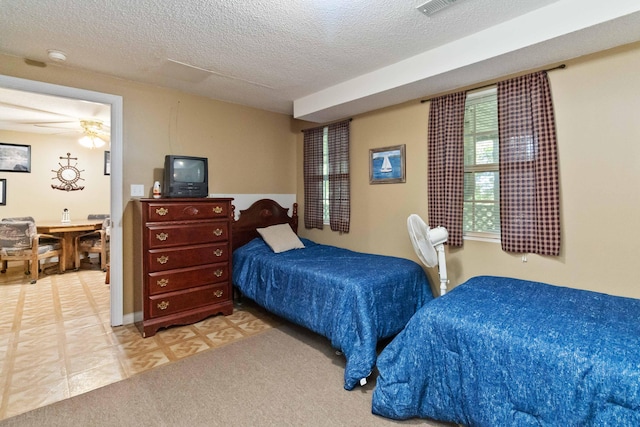 bedroom with a textured ceiling