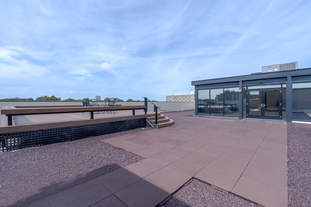 view of patio featuring french doors