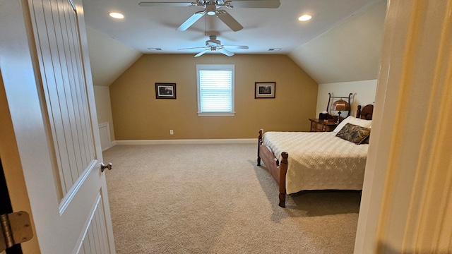 carpeted bedroom featuring vaulted ceiling and ceiling fan