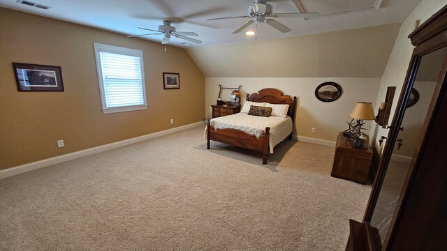 carpeted bedroom featuring vaulted ceiling and ceiling fan