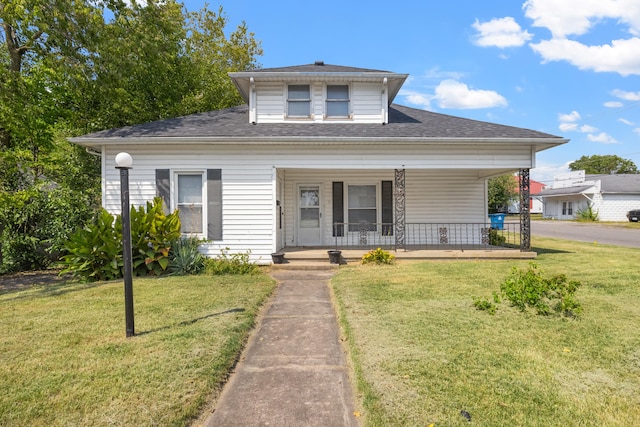 bungalow-style home featuring a front lawn and a porch