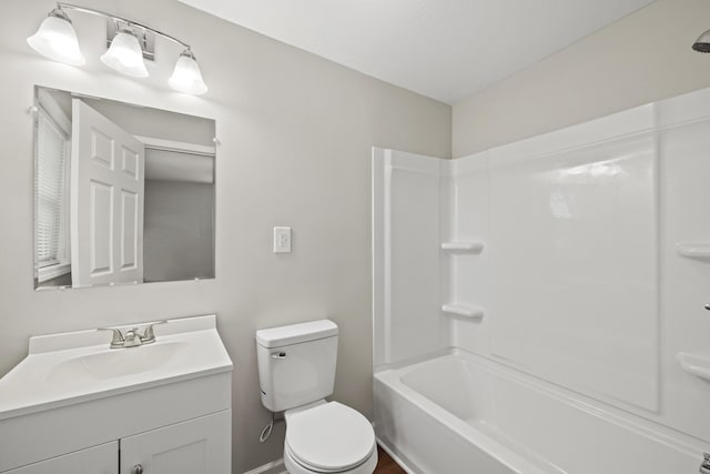 full bathroom with vanity, toilet, and shower / washtub combination