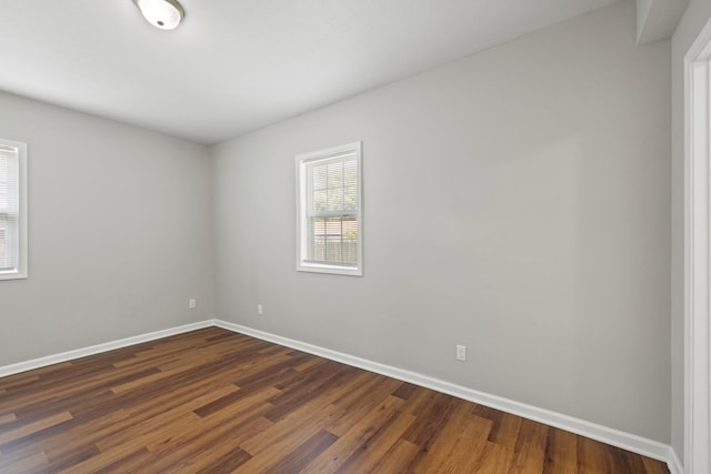 empty room featuring hardwood / wood-style flooring