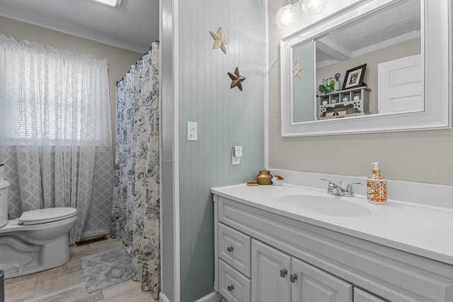 bathroom featuring a textured ceiling, vanity, toilet, and curtained shower