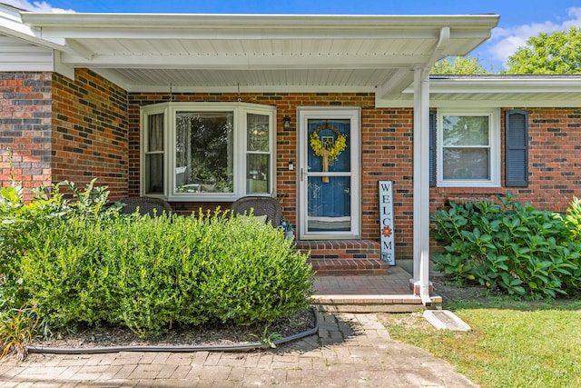 entrance to property with a porch