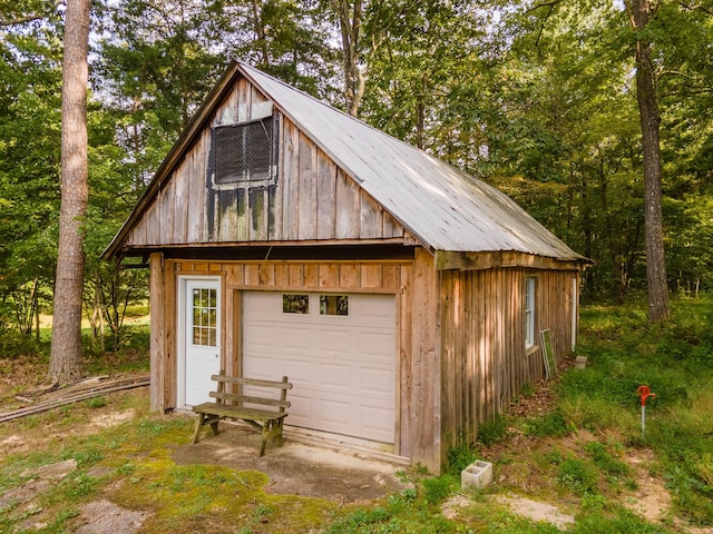 garage with wood walls