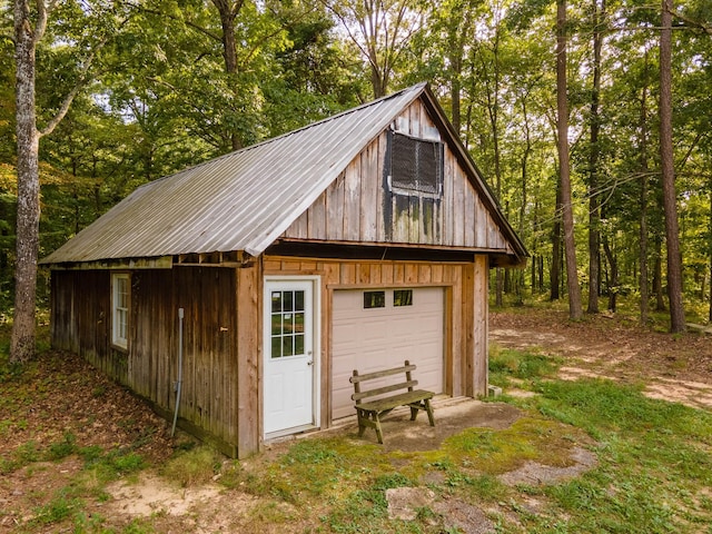 view of outbuilding with a garage