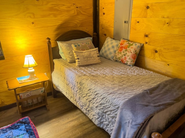 bedroom featuring wood-type flooring