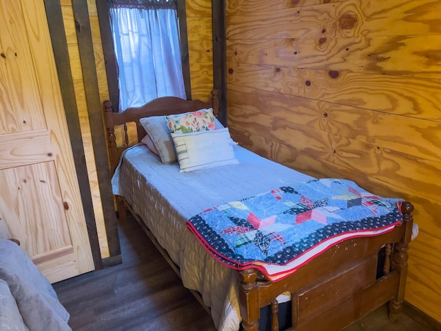 bedroom featuring dark hardwood / wood-style floors