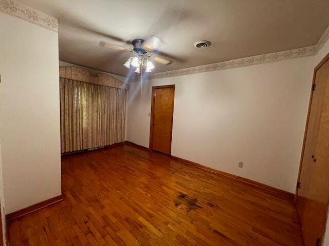 interior space featuring ceiling fan and hardwood / wood-style flooring