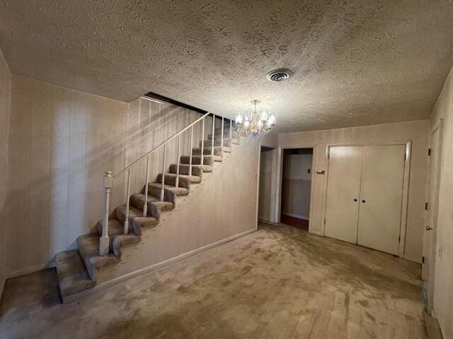 basement featuring a textured ceiling