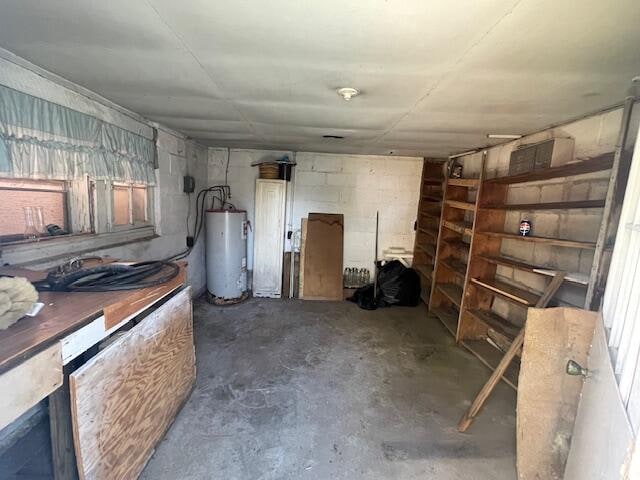 storage area featuring water heater