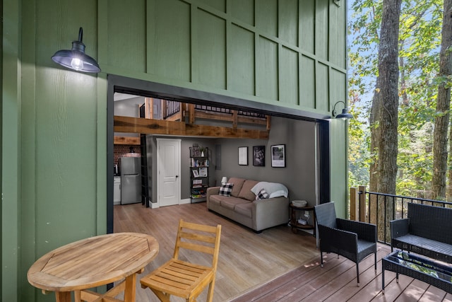 wooden deck featuring outdoor lounge area