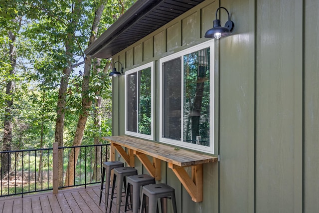 view of property exterior with a deck