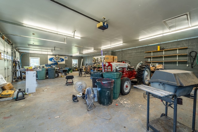 garage featuring a garage door opener