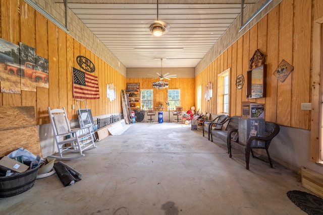 sunroom featuring ceiling fan