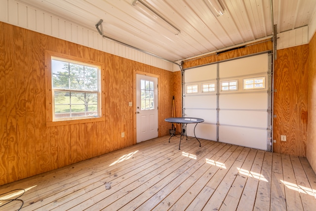 interior space featuring wood walls