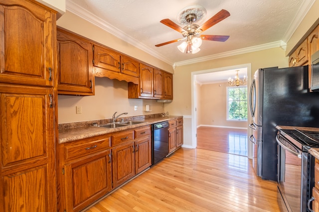 kitchen with dishwasher, light hardwood / wood-style flooring, ceiling fan with notable chandelier, sink, and stainless steel range