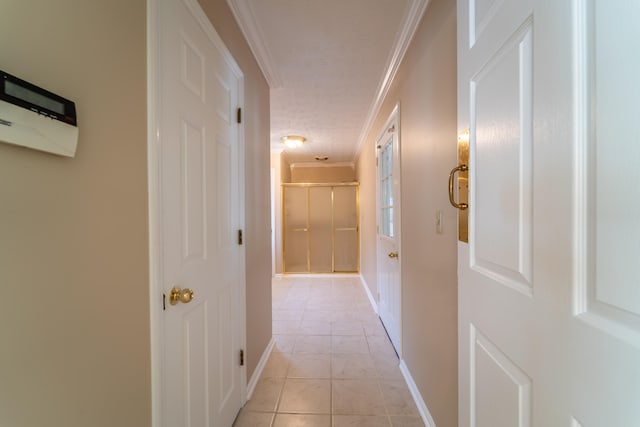 hallway featuring crown molding and a textured ceiling