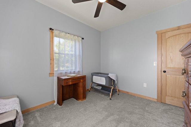 bedroom with lofted ceiling, light colored carpet, ceiling fan, and baseboards