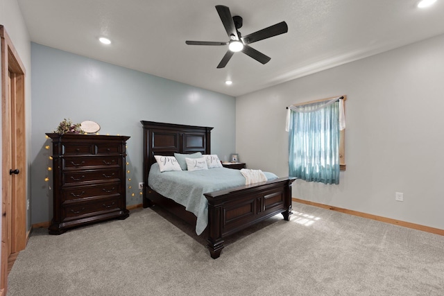 bedroom with baseboards, light colored carpet, a ceiling fan, and recessed lighting