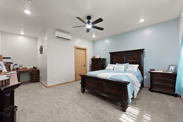 bedroom featuring recessed lighting, an AC wall unit, light colored carpet, and baseboards