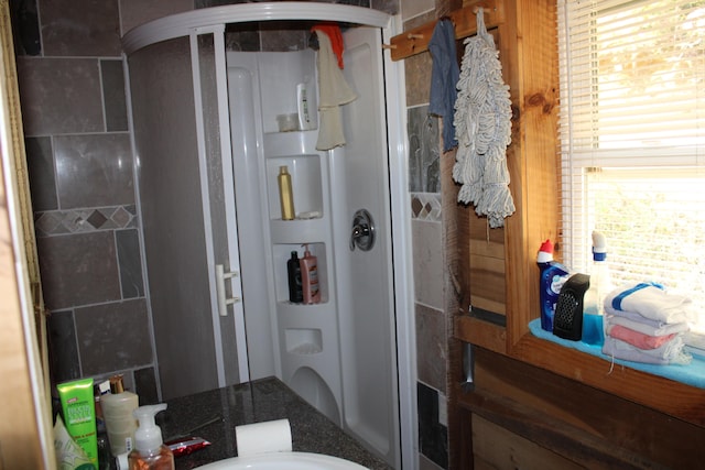 bathroom with an enclosed shower