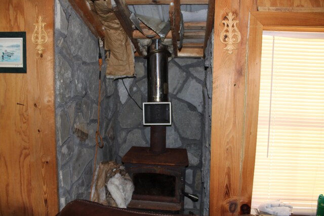 basement featuring a wood stove