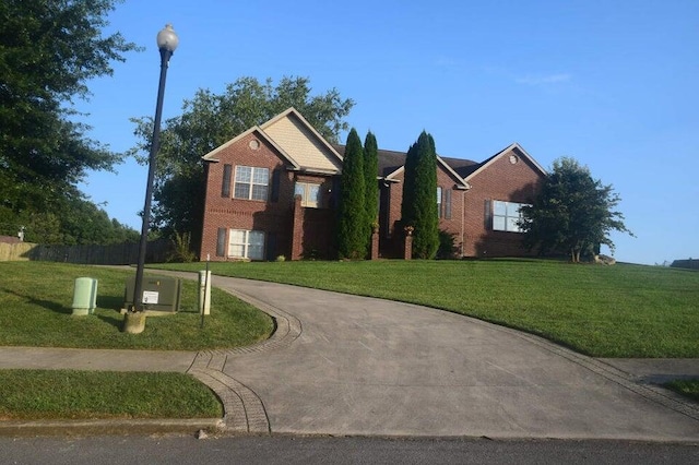 view of front of house with a front lawn