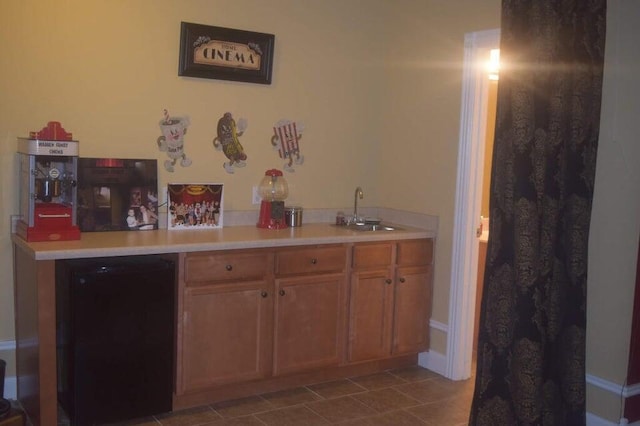 interior space with sink and tile patterned floors