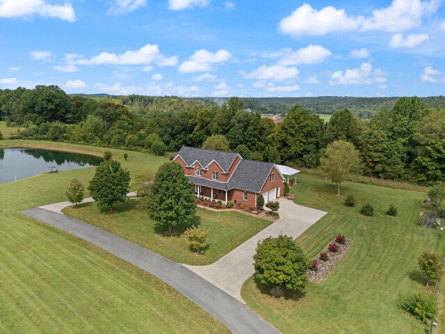 birds eye view of property featuring a water view