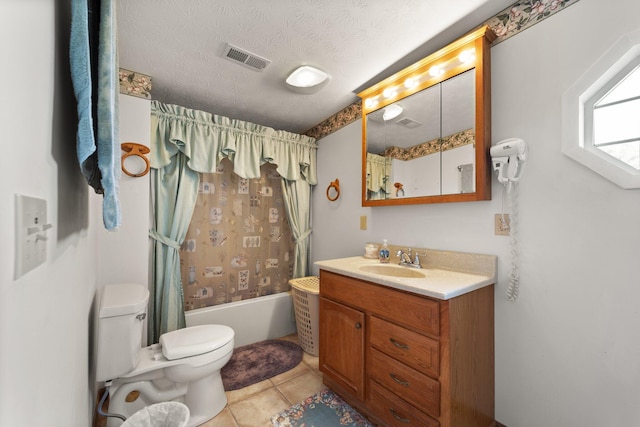 full bathroom featuring vanity, visible vents, shower / bath combo with shower curtain, a textured ceiling, and toilet