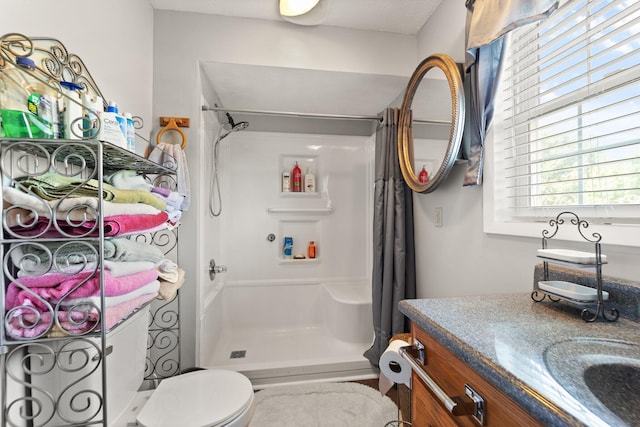 bathroom featuring vanity and a shower with curtain