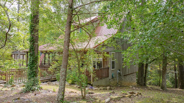 view of front of property featuring a wooden deck