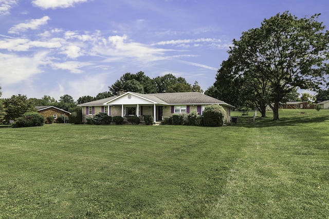 ranch-style house with a front lawn