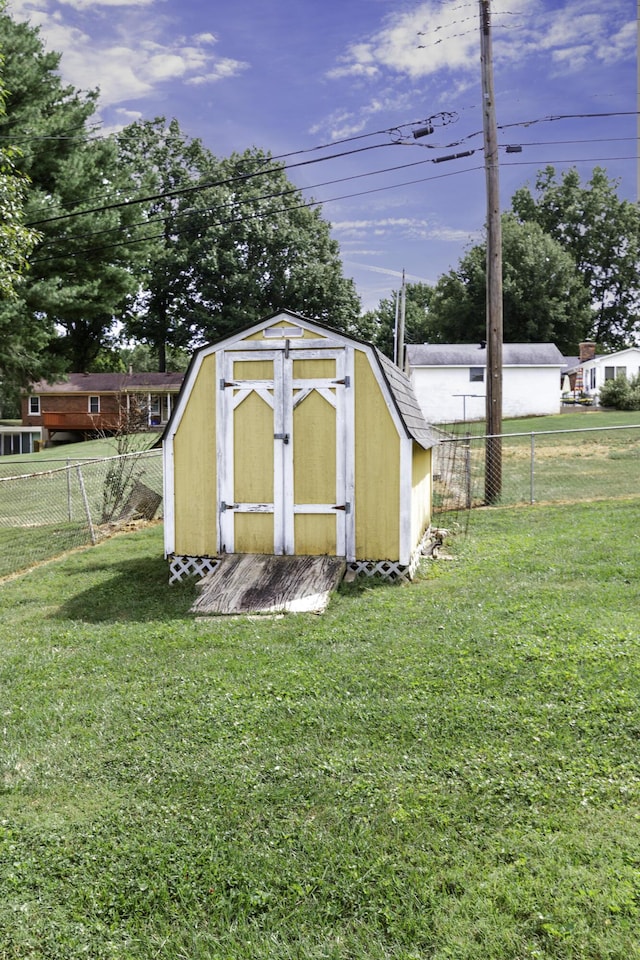 view of shed featuring a fenced backyard