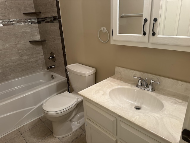 full bath featuring vanity, tile patterned floors, toilet, and tub / shower combination