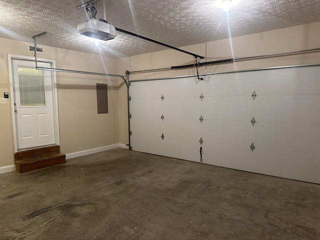 garage with a garage door opener and electric panel