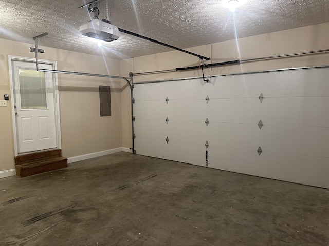 garage featuring baseboards, a garage door opener, and electric panel