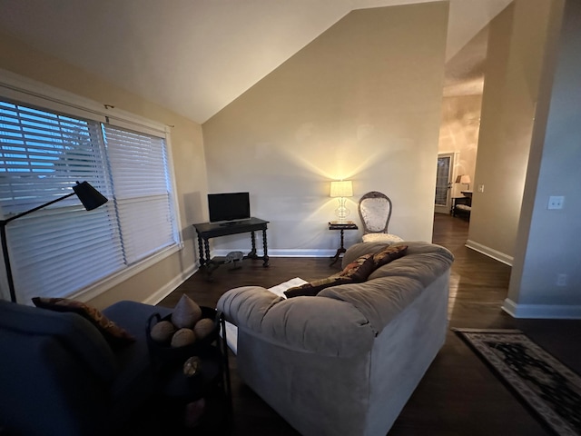 living room featuring vaulted ceiling and dark wood-type flooring