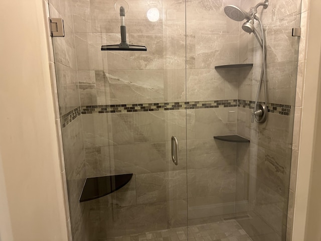 full bath featuring a stall shower