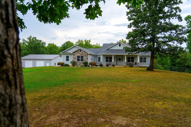 view of front facade featuring a front yard and a porch