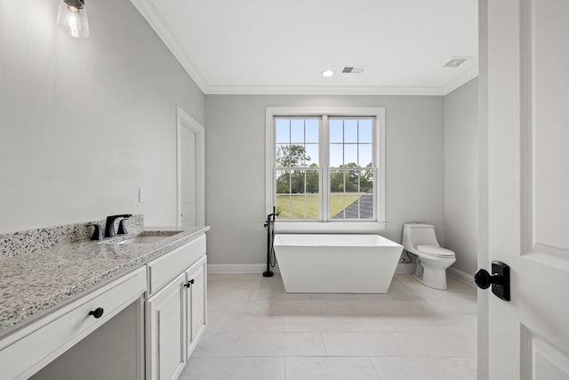 bathroom with ornamental molding, vanity, toilet, and a washtub