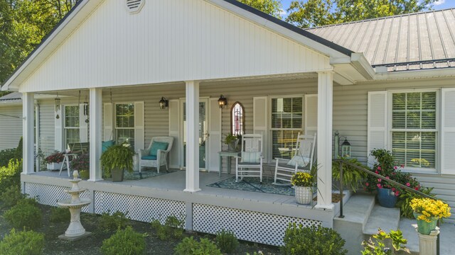 back of house with a porch